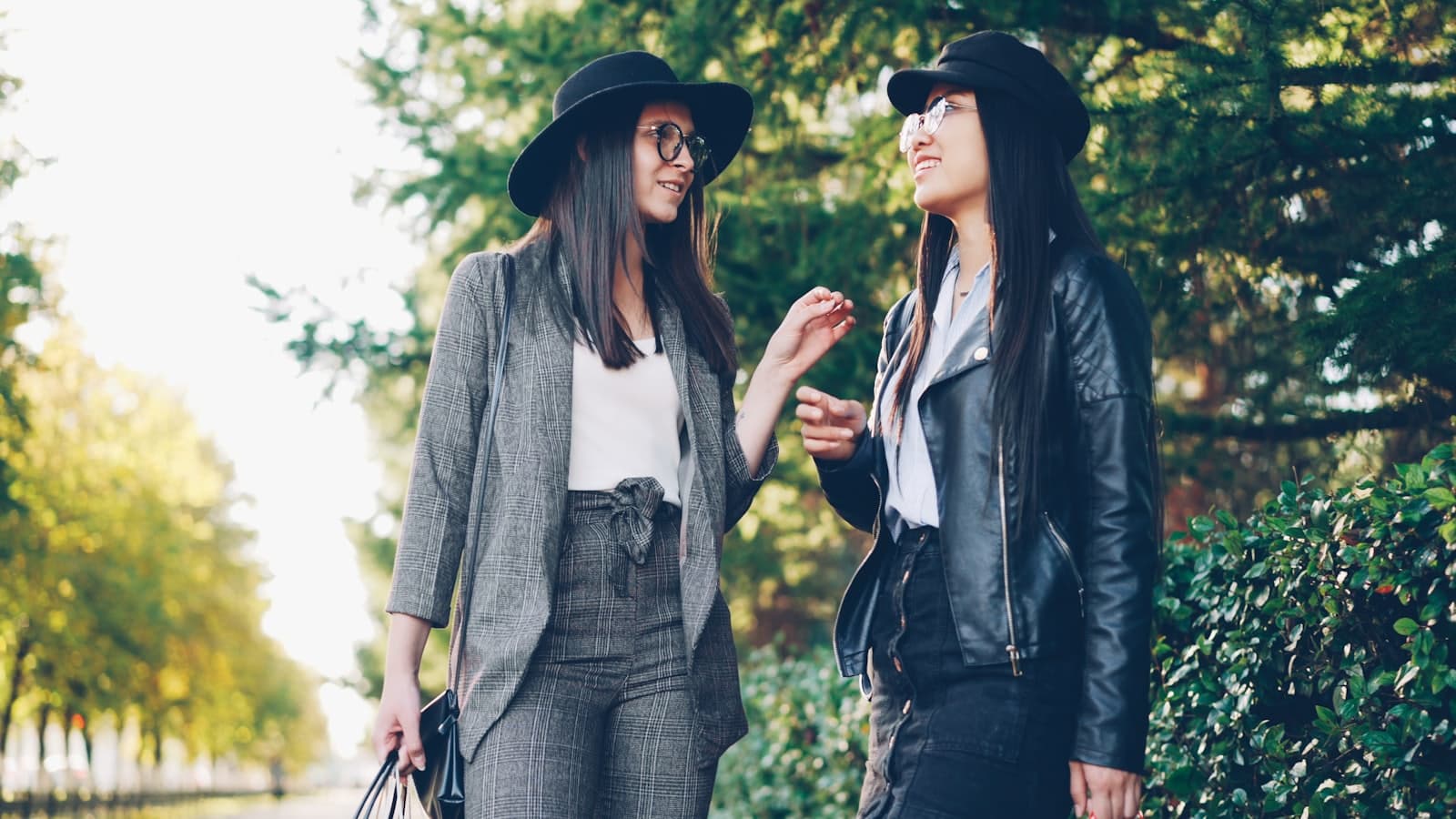 Two people in conversation on a street