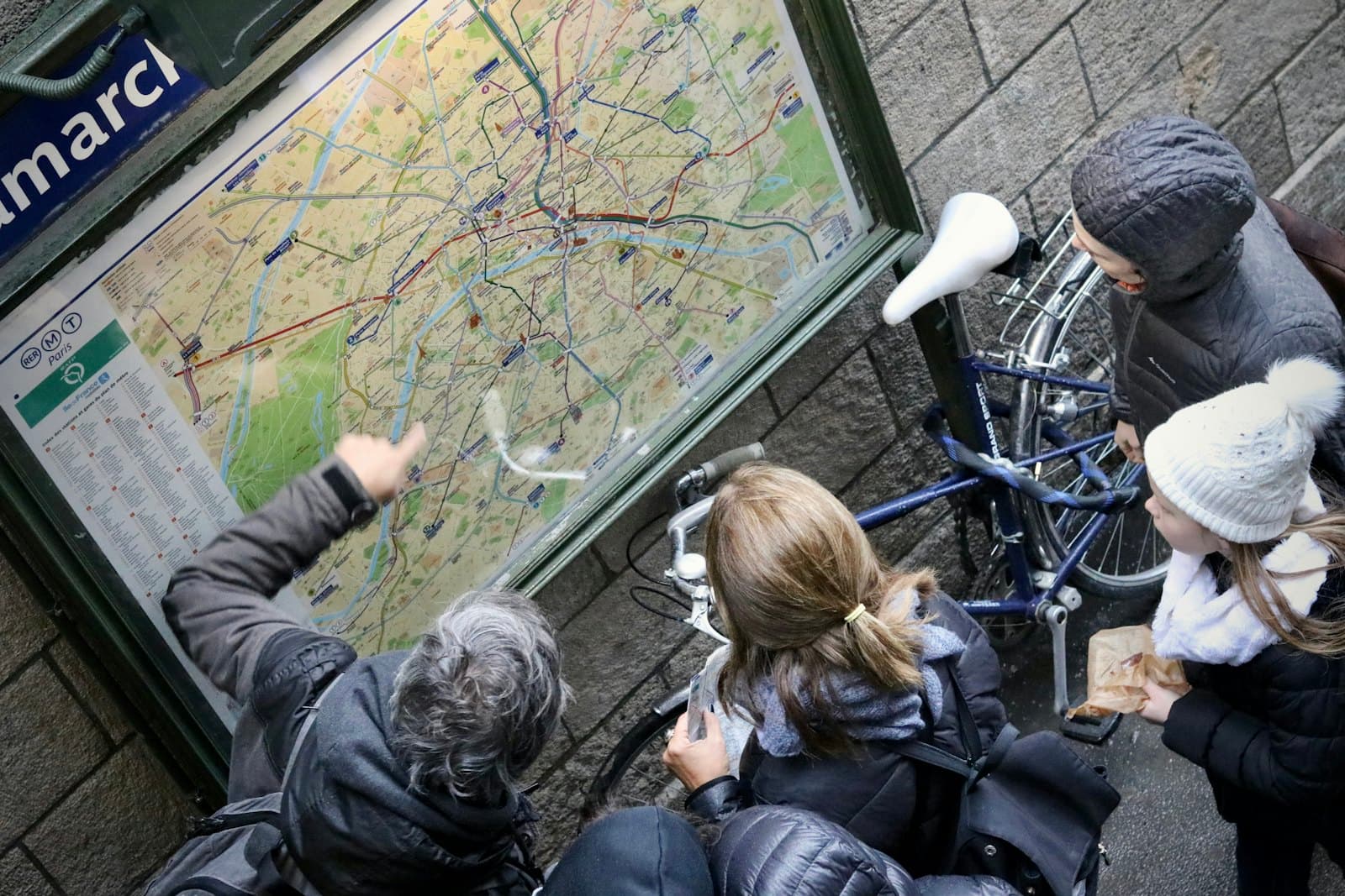 People reading a street map