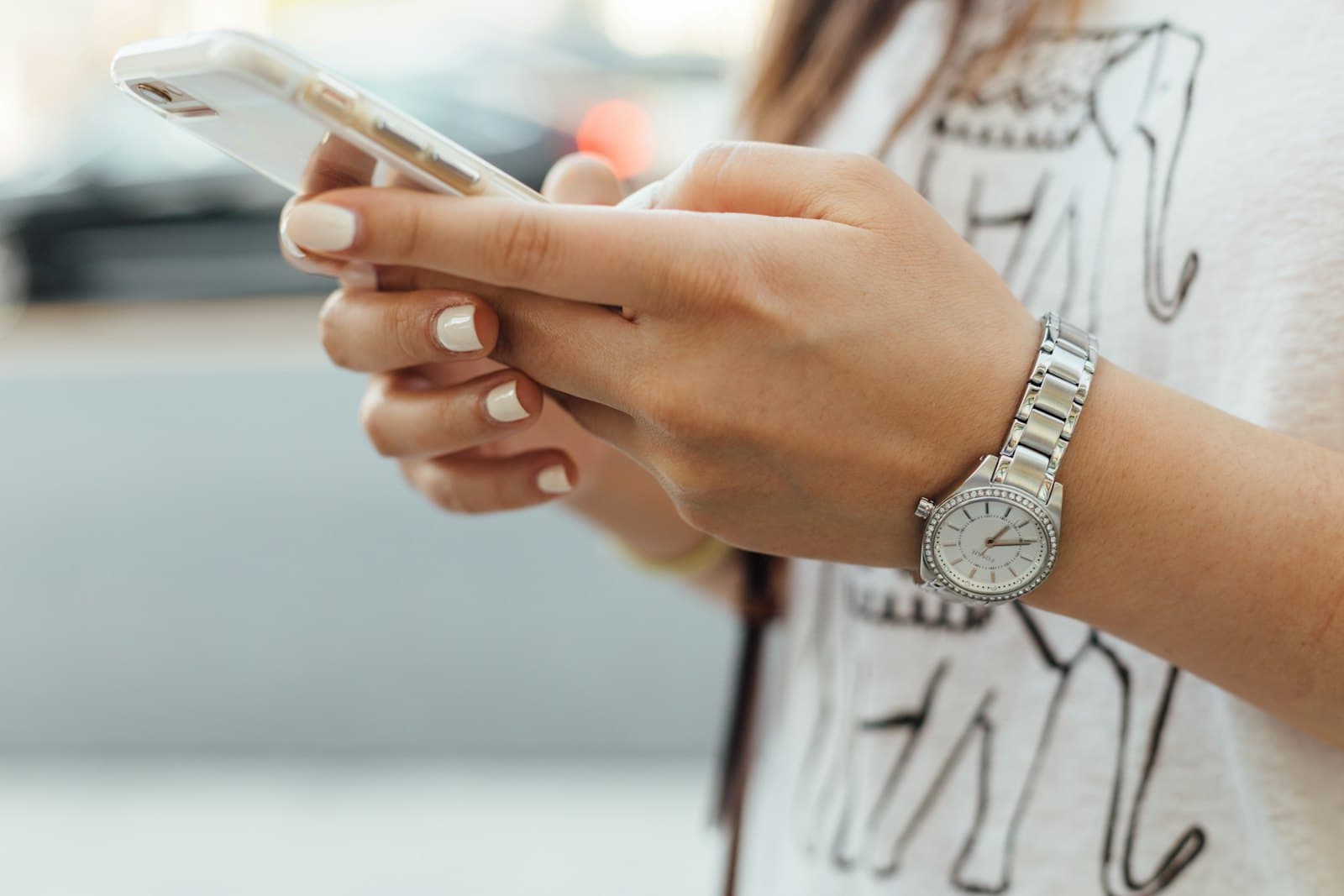 Someone sending a text message